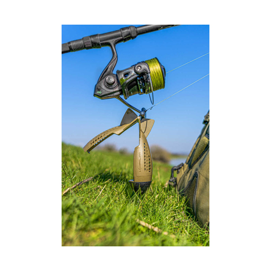 Christmas decorations and branches on green background